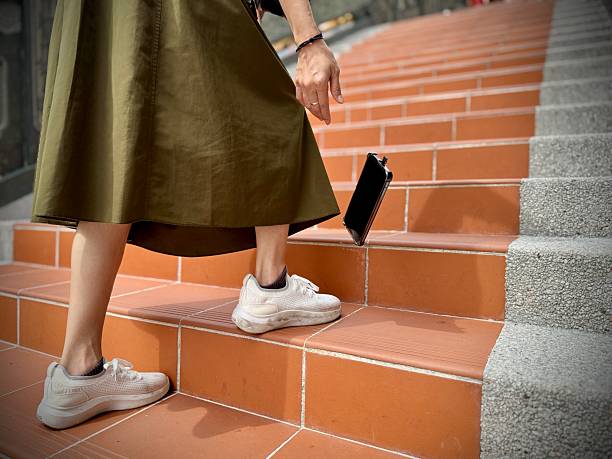 A small misstep leads to a costly accident as the phone crashes against the staircase.