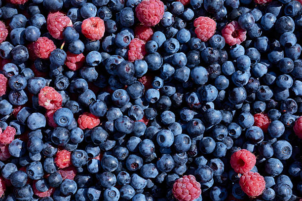 istock blueberries and raspberries wallpaper background 2231939150