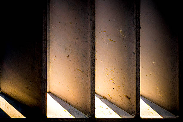 Abstract Light and Shadow on Industrial Metal Shades with Architectural Geometry