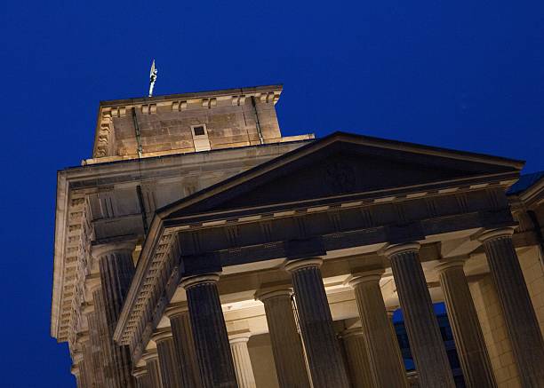 The Brandenburger Gate at Berlin in Germany at night. Architectual feature with Columns