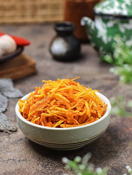 Kentang Mustofa, Indonesian crispy fried potato sticks coated with spicy sweet seasoning.