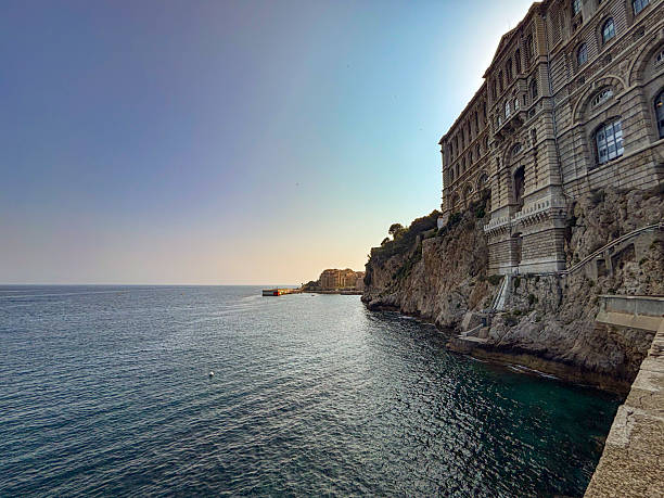 View over the Mediterranean Sea along the Digue de l'Avant Port in Monaco during a summer evening in Monaco-Ville.