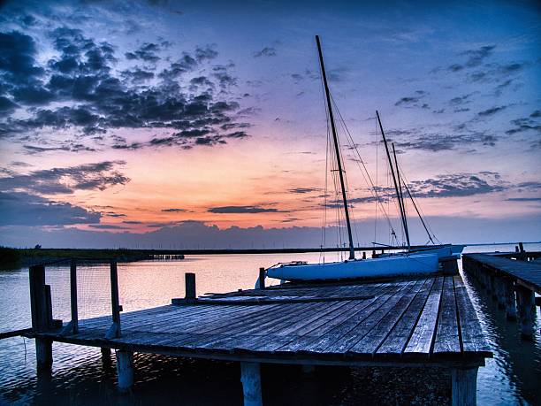 istock Sailboats at Sunset Pier 2231945150