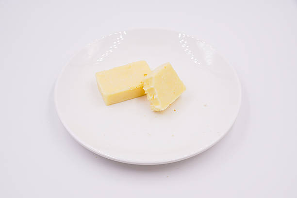 istock Block of mature cheddar cheese 2231950623