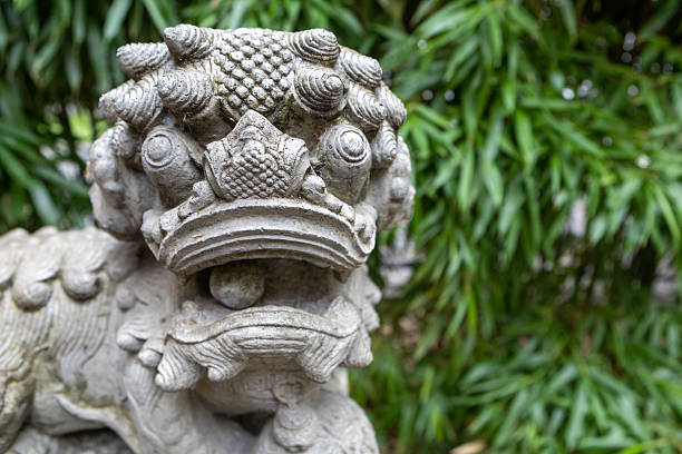 Japanese garden. Gate, statue, plants, Buddha, garden.