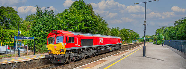August 25th. 2025 . A diesel freightliner locomotive is pulling a goods / freight train at West Midlands Station, England UK. It is a sunny day in summer  and there are no people in the picture. Close up view of diesel locomotive.