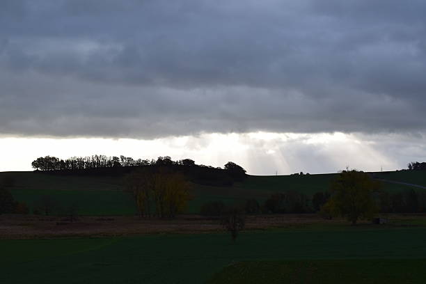 istock rays of light through the darkest clouds 2231951656