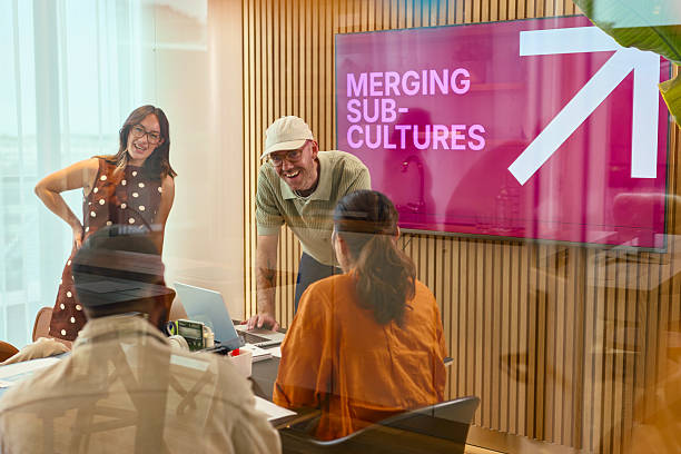 istock Business team discussing merging sub-cultures in modern office 2231951952