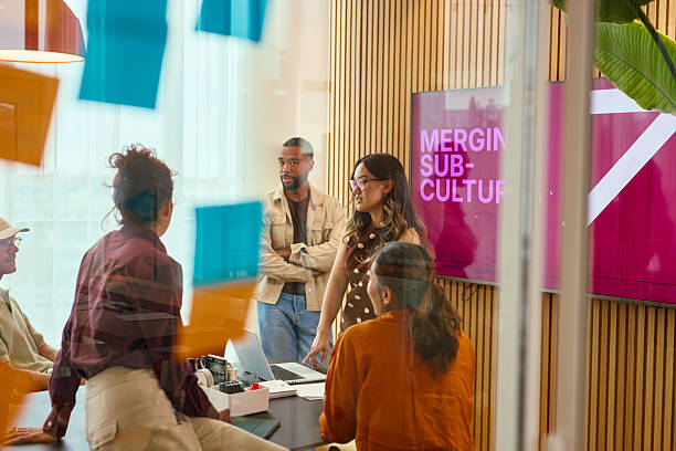 istock Business team collaborating on project in modern office 2231951954