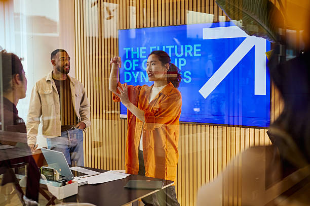 istock Business team discussing future of group dynamics in modern office 2231951969