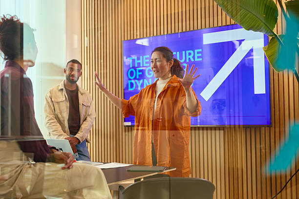 Business team discussing future of group dynamics in modern office