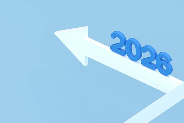 istock 3D number 2026 on a bold white arrow pointing left over a blue background, symbolizing direction, decision-making, and navigating the future. 2231955489