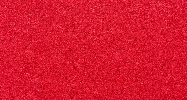 istock Red paper background or backdrop with fine details and smooth texture with copy space for text design element 2231958024