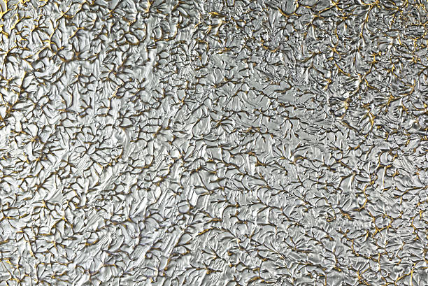 istock decorative glossy metallic abstract backrgound relief silver gold 2231958498