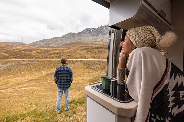 istock Couple Enjoying a Scenic Mountain Camping Escape 2231960301
