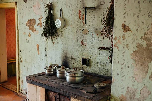 istock Rustic Kitchen with Old Stove and Hanging Herbs 2231966909