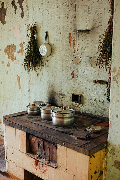istock Rustic Kitchen with Old Stove and Hanging Herbs 2231966917