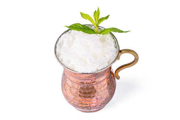 istock Turkish buttermilk in a copper cup on white background. Turkish yogurt drink 2231968215