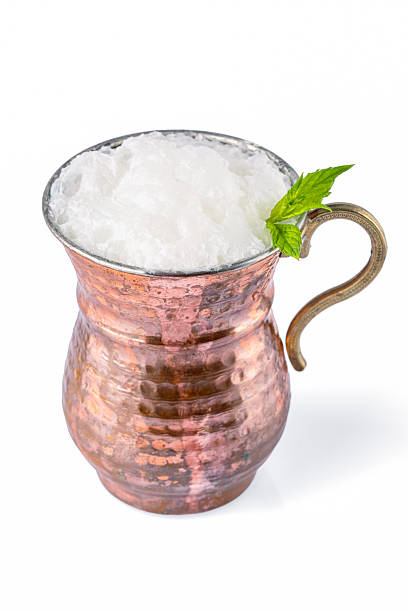 istock Turkish buttermilk in a copper cup on white background. Turkish yogurt drink 2231968216