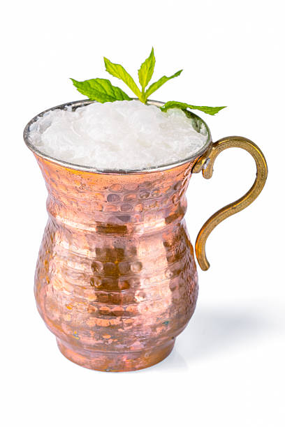 istock Turkish buttermilk in a copper cup on white background. Turkish yogurt drink 2231968217