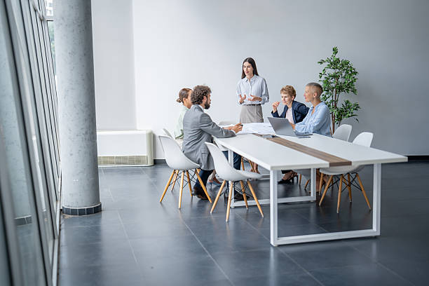 istock Business team discussing new project during meeting in modern office 2231968497