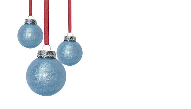 istock Composition from three blue Christmas and New year balls hanging on ribbon, white background 2231969455