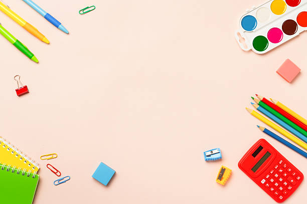 istock School supplies on colored background. 2231970440