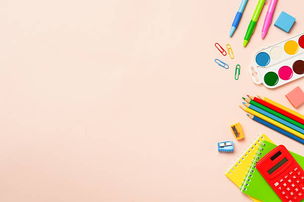 istock School supplies on colored background. 2231970443