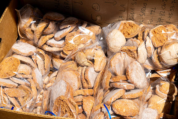 istock Plastic bags with brown cookies in cardboard box 2231974577