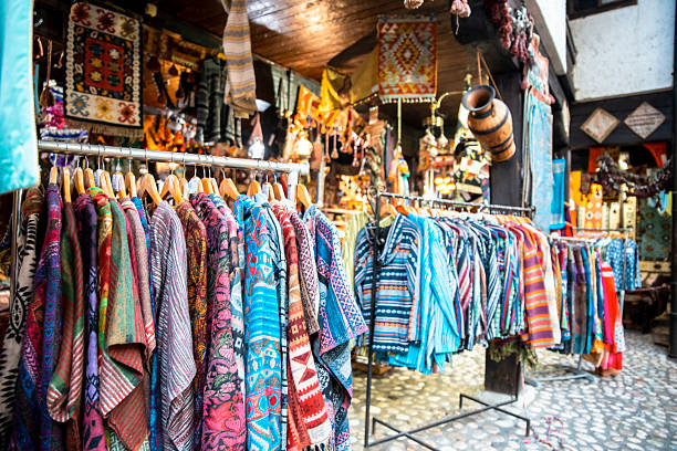 istock Vibrant clothing and souvenirs at bazaar market 2231978778