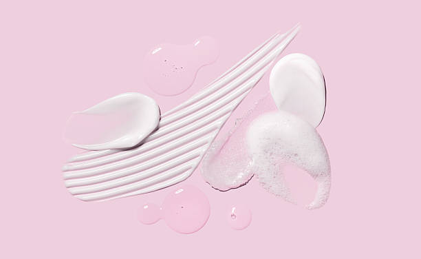 istock sample smear of creamy white texture on light pink background 2231981965