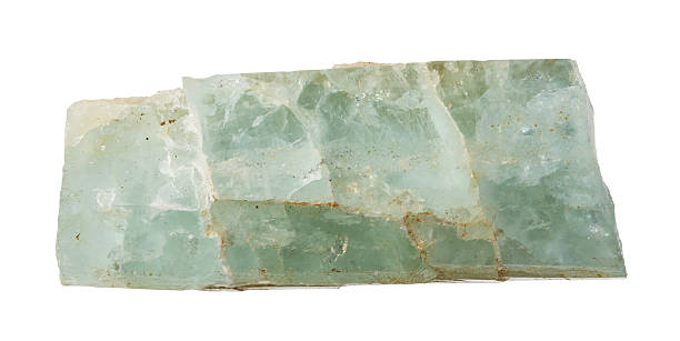 natural rough green beryl crystal cutout on white background closeup