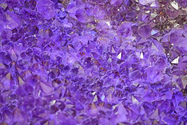 istock Purple crystal mineral background 2231983529