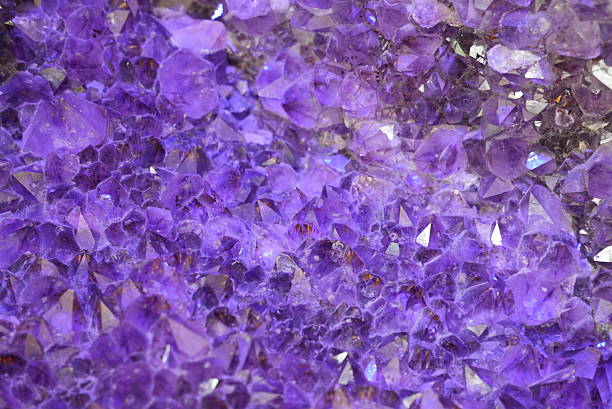 istock Purple crystal mineral background 2231983538