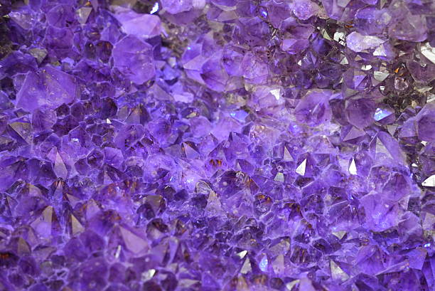 istock Purple crystal mineral background 2231983564