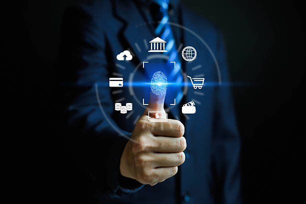 istock Businessman using fingerprint scan for digital banking and secure payment authentication, symbolizing fintech, online transaction, cybersecurity, and biometric technology in financial services. 2231985976