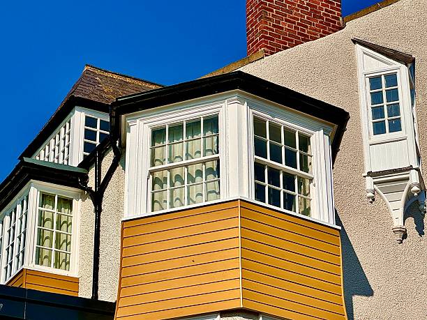 Classic style home facade with triangle roof tops.
