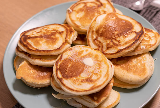 istock Freshly baked pancakes on the ceramic plate. Food 2231988595
