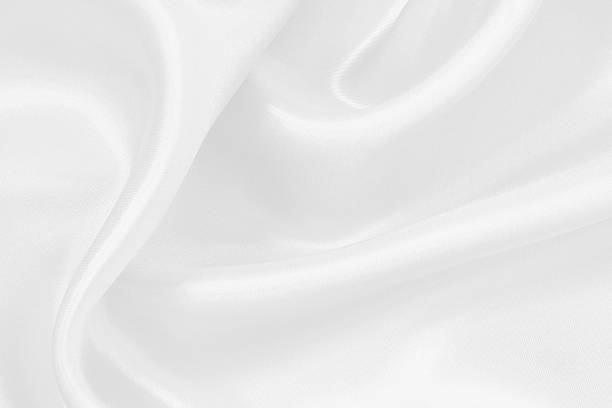 istock White fabric texture for background and design, beautiful pattern of silk or linen. 2231989677