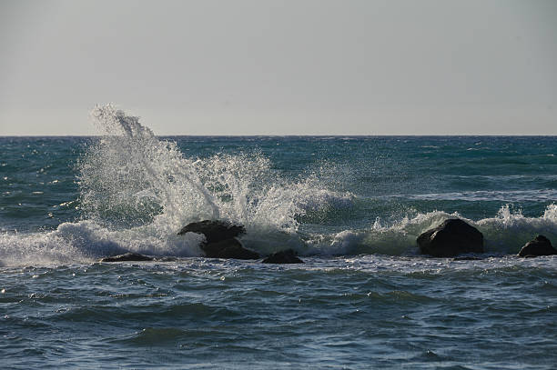 istock Mediterranean Sea Waves Crashing on Rocks Cyprus 2231993096