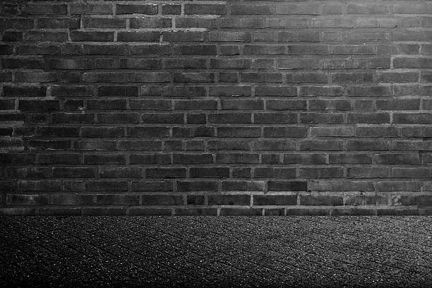 Surface of the black floor and wall. Abstract pattern of tile floor and brick wall. Mock up. Copy space. Wall textured background