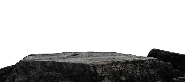 istock Rock, Stone podium stage isolated on white background for Product Display,Black sand Rock Stand with rough surface texture,Nature Rock cliff element with clipping path.Stone garden decoration 2231997546