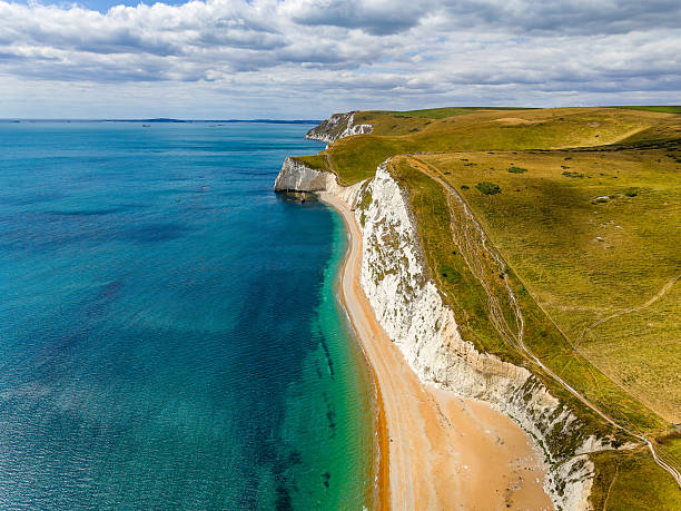 istock Aerial View of Durdle Door's White Chalk Cliffs, England 2231997629