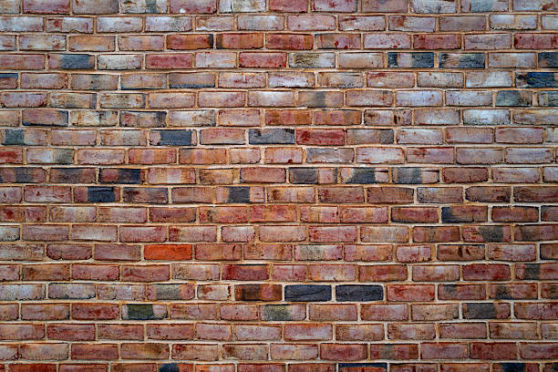 istock Brickwall, vintage texture. Red brick wall for construction themes. Brick wall background. Textured bricks for design projects. Bricks structure. Brick wall pattern. Wall from bricks. 2232012940