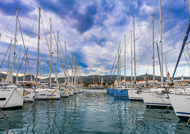 Trogir, Croatia, 3 April 2025 - Large amount of sailingboats waiting for the summer to be rented out