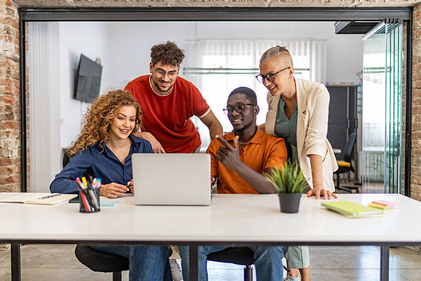 istock Diverse business team collaborating on laptop in modern office 2232013751
