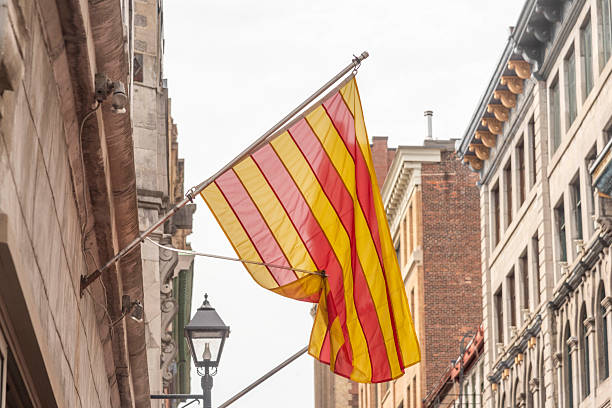 The Catalonia or Senyera flag on three flag poles