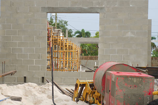 istock Partially Constructed Cement Block Building Foundation on a Cloudy Day 2232016143