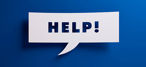 istock White speech bubble with the word help in front of a blue colored wall - 3D illustration 2232019193