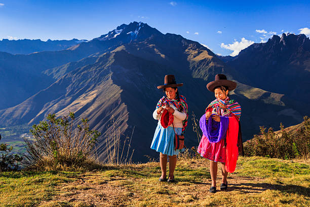 istock Peruvian women spinning wool by hand in Sacred Valley, Peru 2232019213